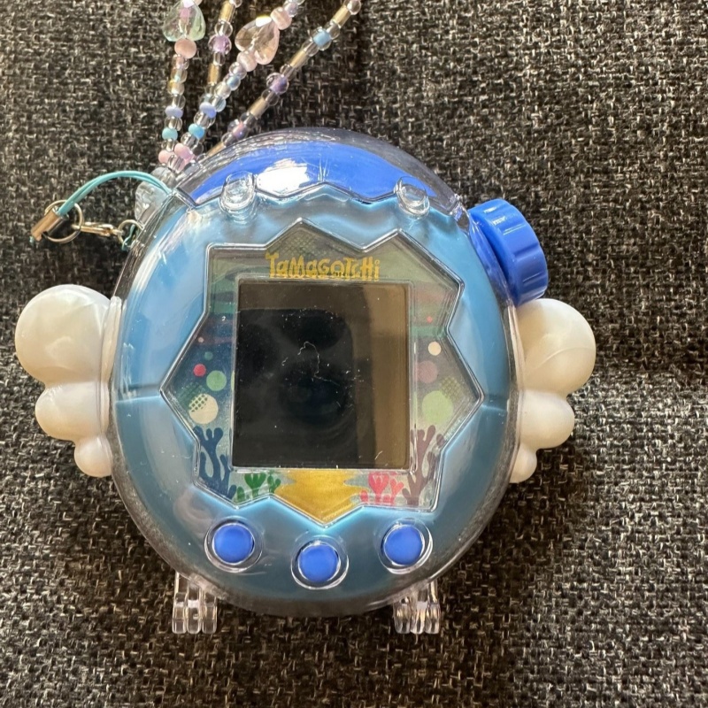 Bandai Model Tamagotchi - Neu auf Lager Tamagotchi Schutzhülle Glitzerflügel